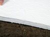 Crawl space insulation installed in Wisconsin on a dirt floor