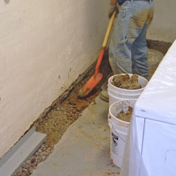 Digging a trench for a French Drain system in Green Bay