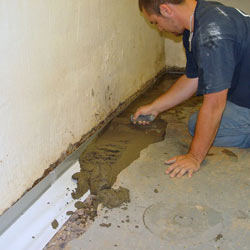 Testing a French drain system in a De Pere home.