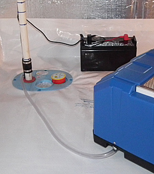 Closeup of a crawl space sump pump installed in Neenah