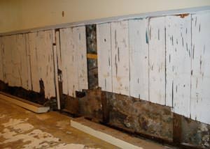 A wet, flooded finished basement in Marinette