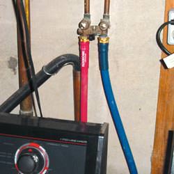 Washer hoses in a basement  in Menominee