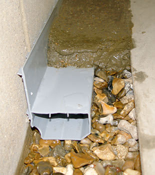 A basement drain system installed in a Manitowoc home