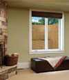 An egress window well installed within a finished basement space in Stevens Point.