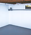 Oshkosh, WI wet basement wall covering that tucks into a perimeter drainage system