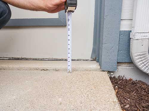 Sunken driveway raised with PolyLevel® Sunken driveway raised with PolyLevel®