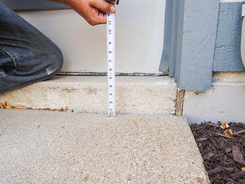 Driveway sinking near garage Driveway sinking near garage