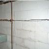 Severe foundation damage from a long crack in a bucking wall of a Kaukauna home.
