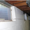 A foundation showing severe inward buckling along the windows in a Rhinelander home.
