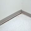 A partition wall separating from the floor in a Shawano home.