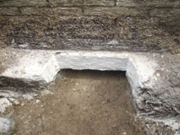 Preparing the foundation footing for a home foundation repair in Menasha