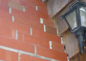 a repaired chimney in West Bend that had shown serious foundation damage and was repaired with a helical pier system.