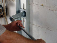 Mounting a foundation wall channel anchor in Manitowoc.