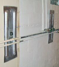 A foundation wall anchor system used to repair a basement wall in Two Rivers